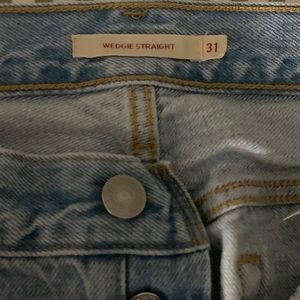 Brand new, never worn, size 31 light blue denim wedge Levi’s.